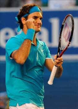 El tenista suizo, Roger Federer, celebra un punto durante el partido de cuartos de final. (Foto: Joe Castro)