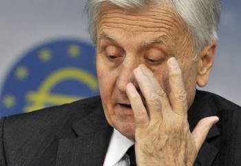Jean-Claude Trichet, en su comparecencia de ayer. (Foto: BORIS ROESSLER)